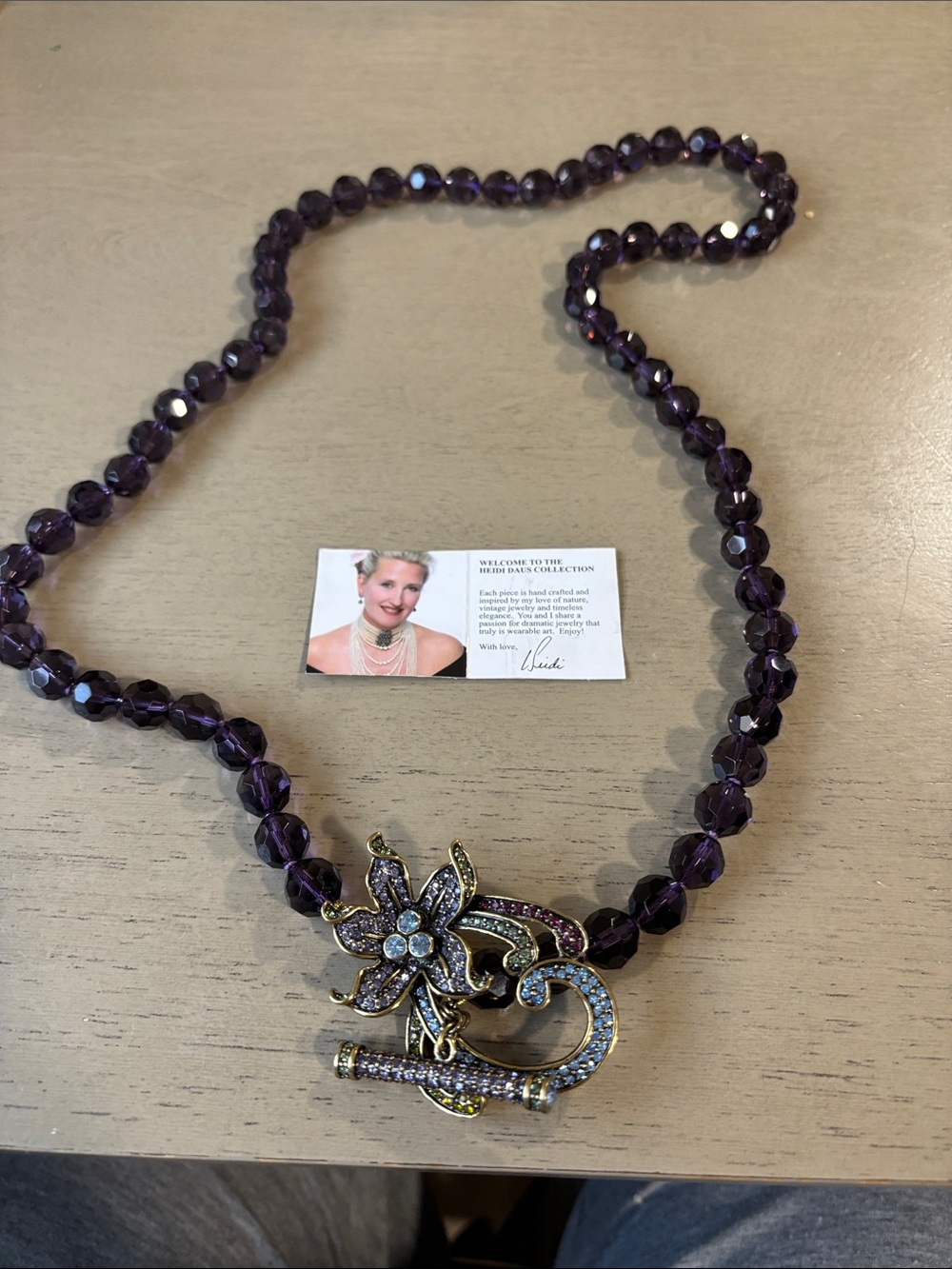 Purple Beaded Necklace with Gold Floral Crystal Pendant